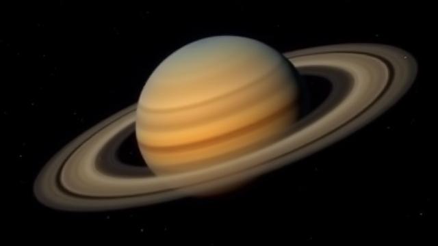 Close-up view of Saturn and its rings through a high-powered telescope