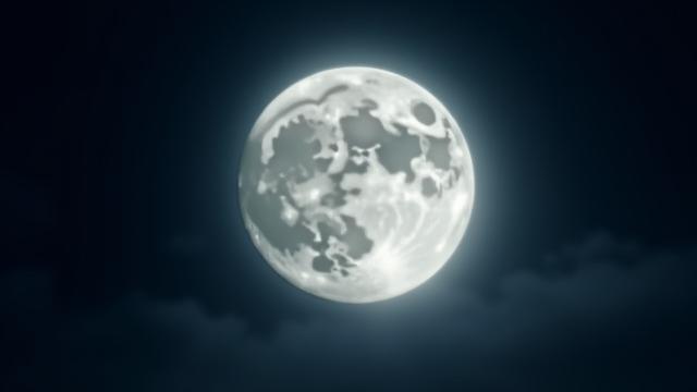 A large, radiant supermoon glowing against a slightly cloudy night sky